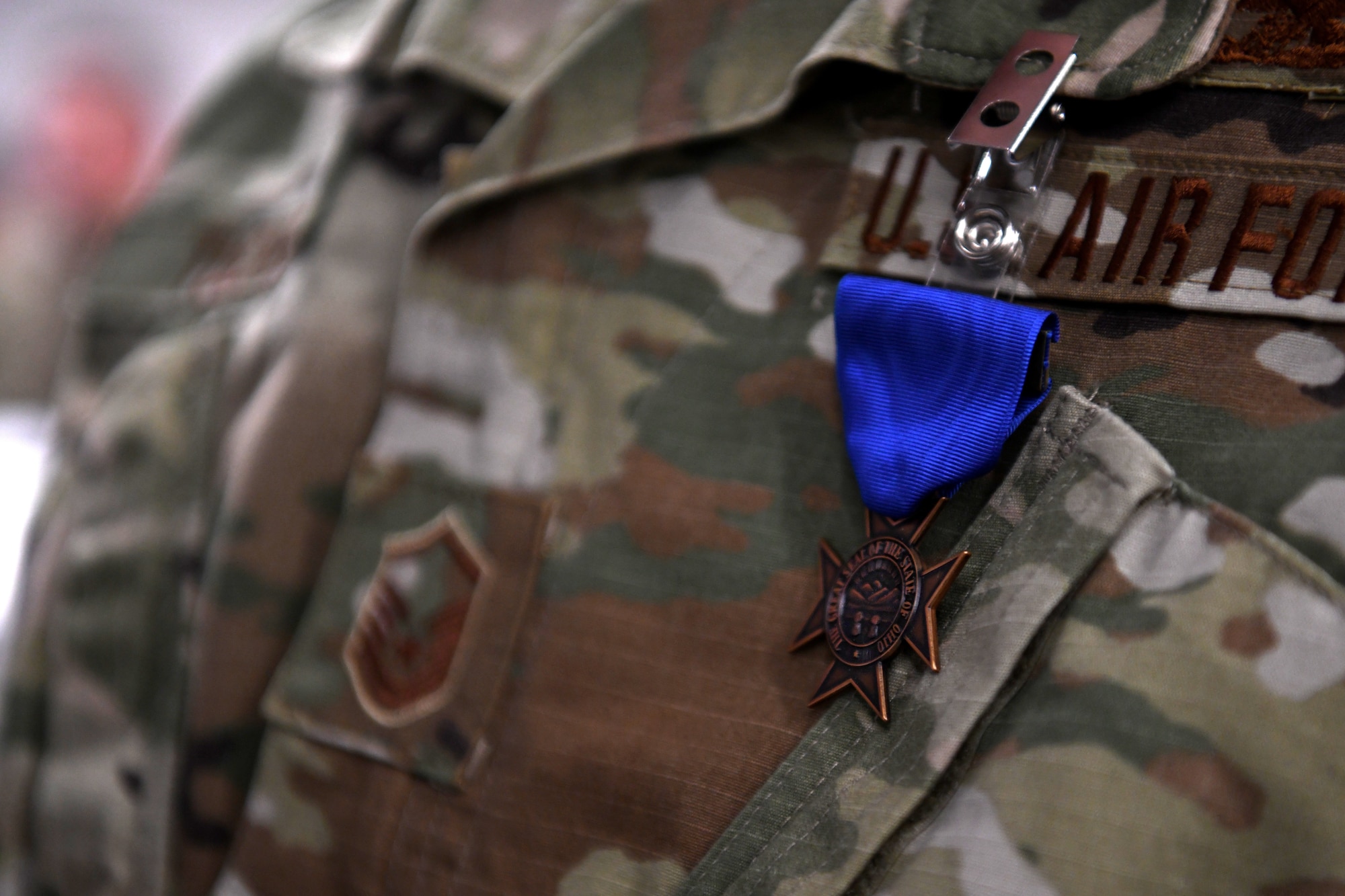 The citation for the Ohio Cross is pinned to U.S. Master Sgt. Ryan Tuckers uniform after Ohio’s Lt. Governor Jon Husted awarded the Ohio Cross to Tucker during the Ohio National Guard’s Joint Senior Leaders Conference Feb. 14, 2020 in Columbus, Ohio. The Ohio Cross is awarded to any member of the state military forces who distinguishes themselves by gallantry and intrepidity at the risk of his/her life. (U.S. Air Force photo by Tech. Sgt. Shane Hughes)