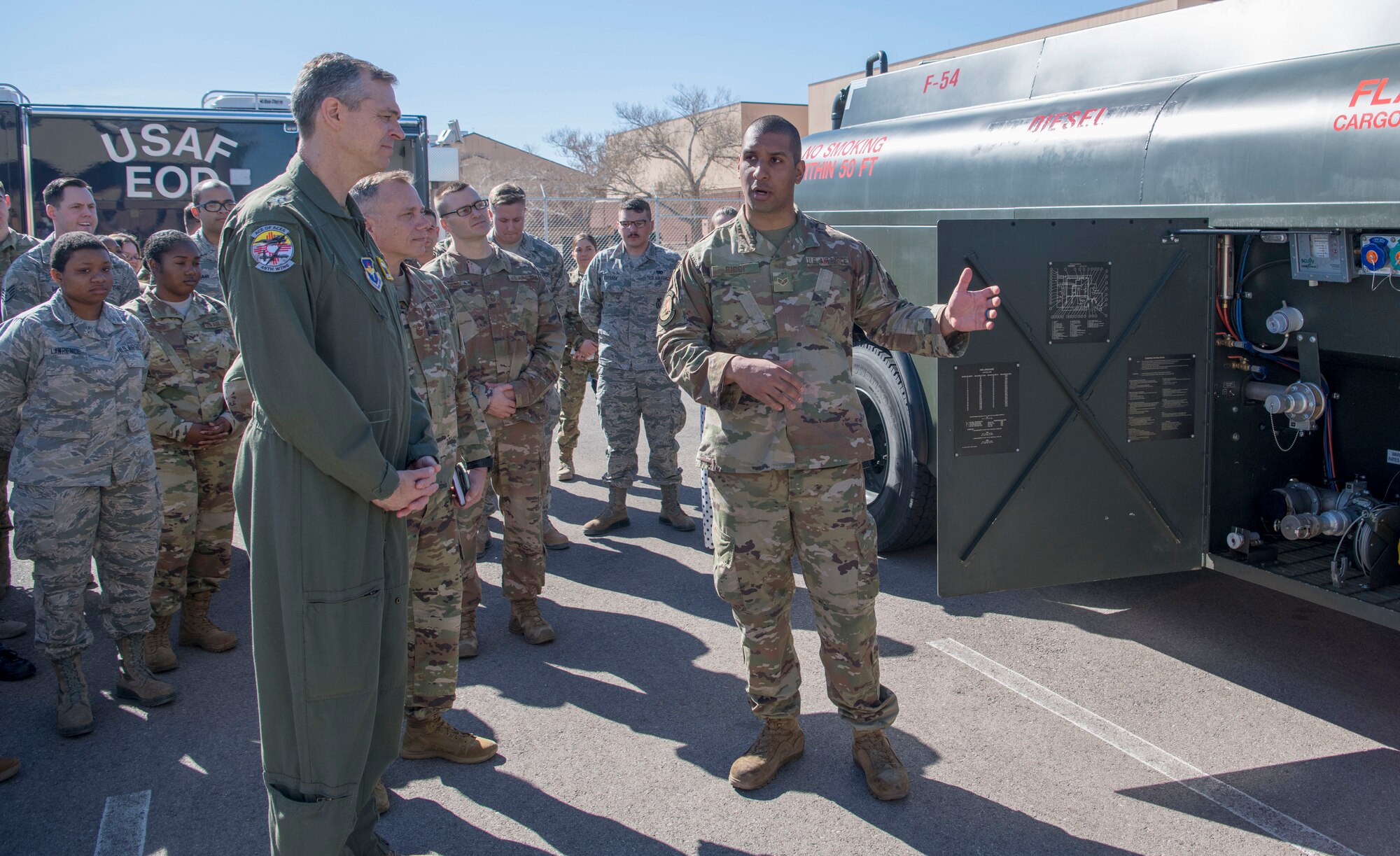 Maj. Gen. Craig Wills, 19th Air Force commander, is briefed on an R-13 Mobile Refueling Unit by Senior Airman Michael Ricci, 49th Logistics Readiness Squadron preventive maintenance technician, Feb. 14, 2020, on Holloman Air Force Base, N.M. Ricci fitted an adapter and nozzle on the R-13 to prevent fuel commingling, which is the mixing of two separate products, such as gasoline in an aircraft or jet fuel into diesel vehicle. (U.S. Air Force photo by Airman 1st Class Quion Lowe)