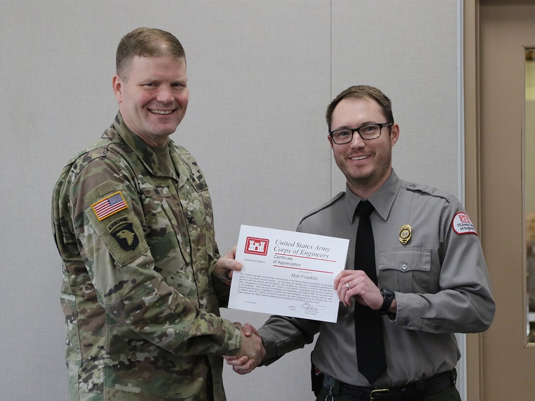 District Commander presents award.