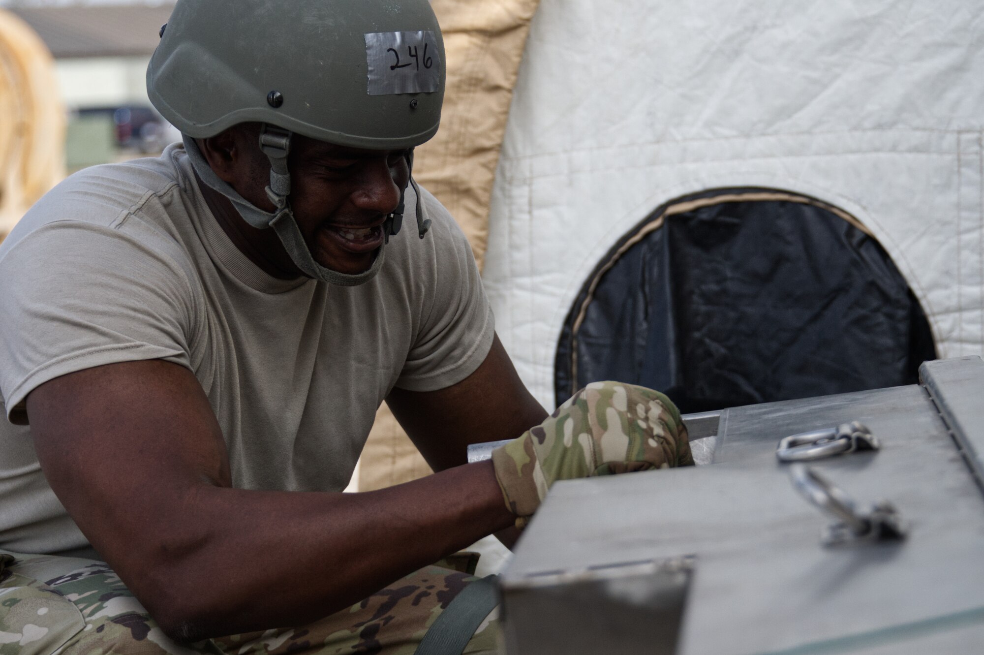 Photo of Airman working on equipment.