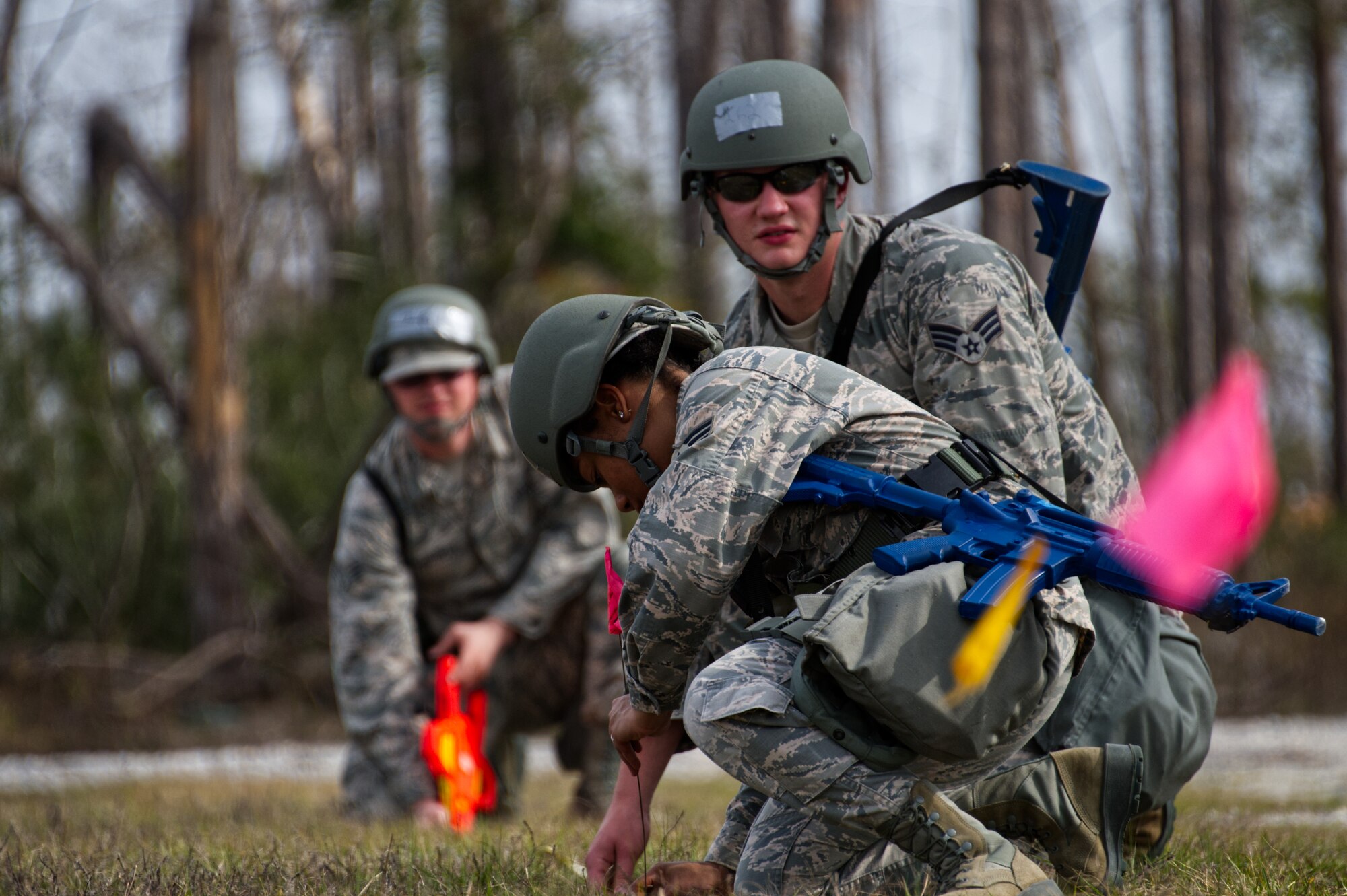 Photo of Airmen working in field.