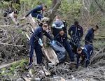 Sailors pick up trash