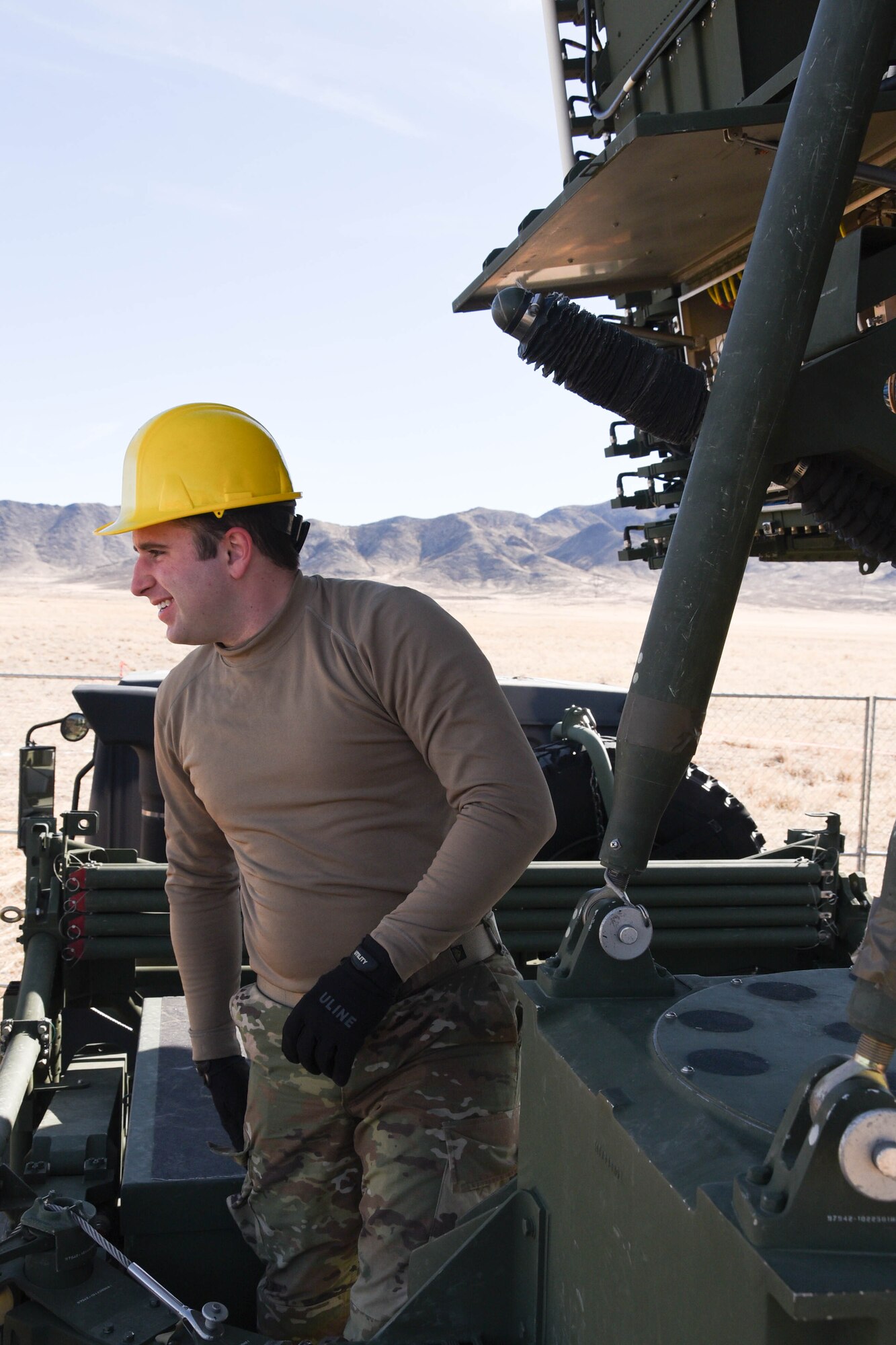 On the ground at Nellis Air Force Base, Nevada, Battle Manager Crews from the 729th Air Control Squadron working in a Control and Reporting Center are engaged in directing the Airspace for Red Flag 20-1; More than 100 miles away, members of the same unit built a deployed radar site in the middle of the desert to supplement the Command and Control systems used to direct the airspace of RED FLAG 20-1 (U.S. Air Force photo by 2d Lt. Ashlyn K. Paulson).