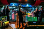 The U.S. Air Force Pacific Brass Band plays a concert during the Koror Night Market following the Civic Action Team (CAT) Palau change of charge ceremony. During the ceremony, U.S. Army 84th Engineering Battalion CAT 84-06 was relieved by U.S. Air Force 36th Civil Engineer Squadron CAT 36-04. The Civic Action Team Palau provides construction support to the host nation, assists and trains apprentices with general engineering skills, facilitates a medical outreach program and conducts community service projects. CAT Palau is an integral part of the U.S. mission to assist and support the development of the Republic of Palau through the Compact of Free Association between the two nations.