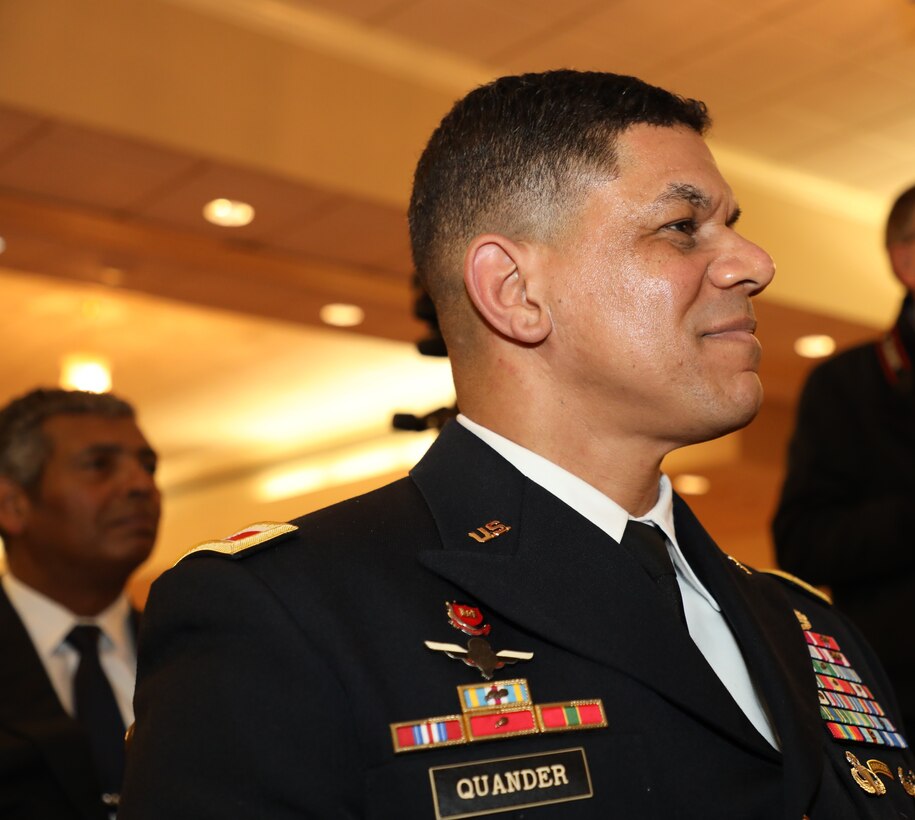 Col. Mark Quander listens to a speaker during his promotion ceremony to brigadier general. Quander is the commandant of the U.S. Army Engineer School at Fort Leonard Wood, Missouri, but was promoted during a ceremony at Joint Base Myer-Henderson Hall in Arlington, Virginia, on Feb. 14, 2020.