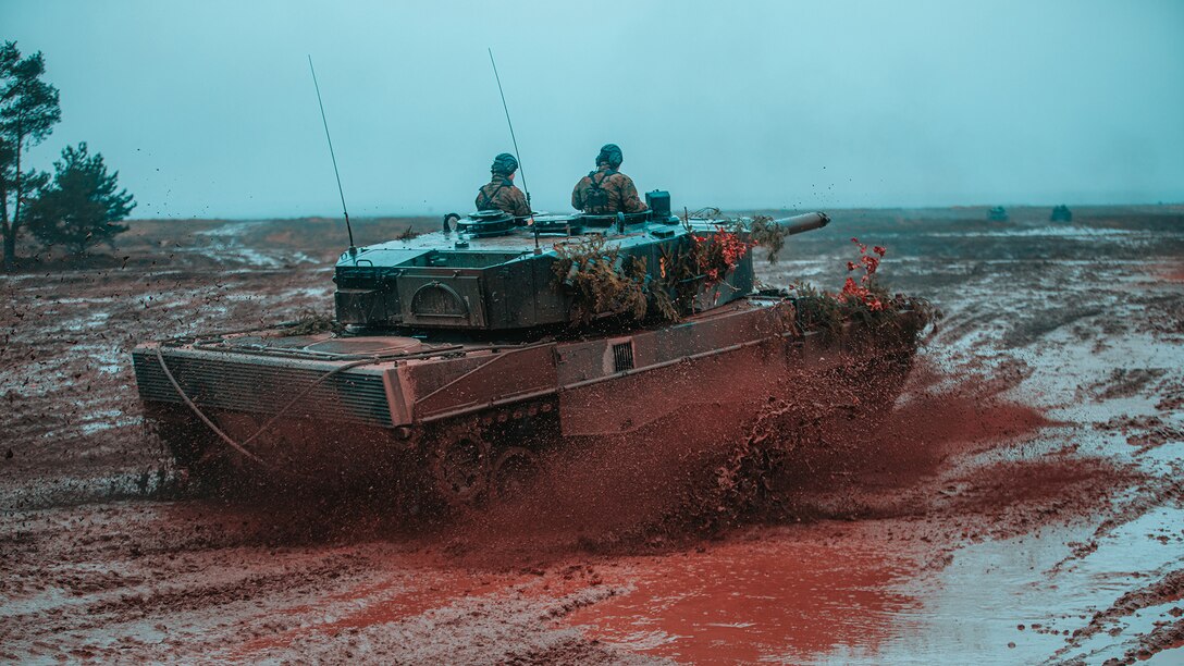 Polish and Romanian Soldiers work together in support of NATO's enhanced Forward Presence Battle Group Poland