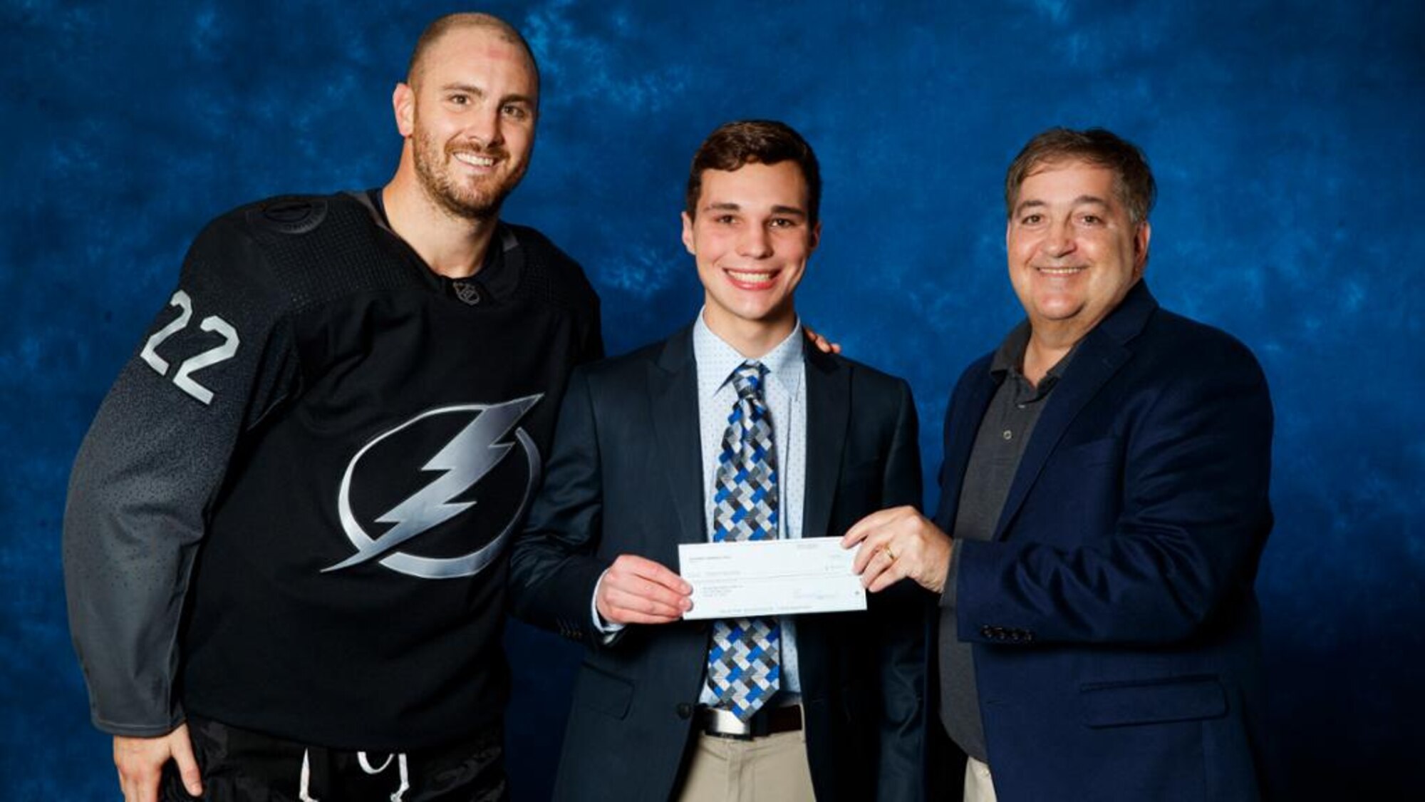 Jordan Jasper, a dependent youth from MacDill Air Force Base, receiving award.
