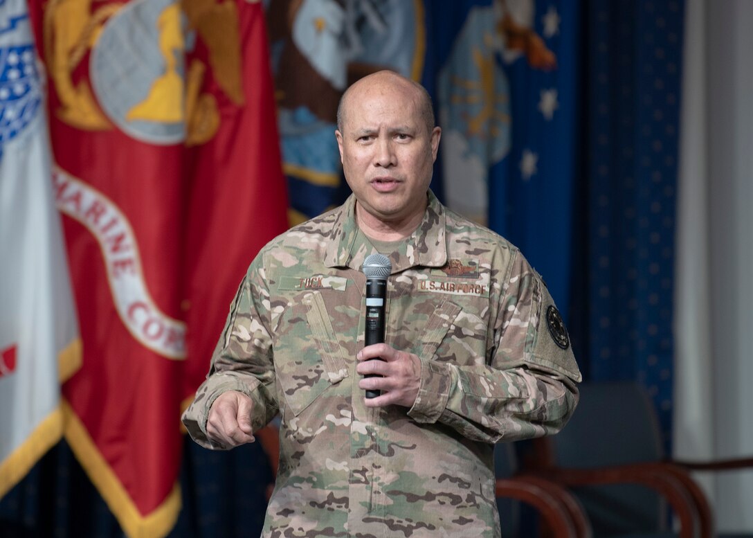 genera officer talks in to a microphone