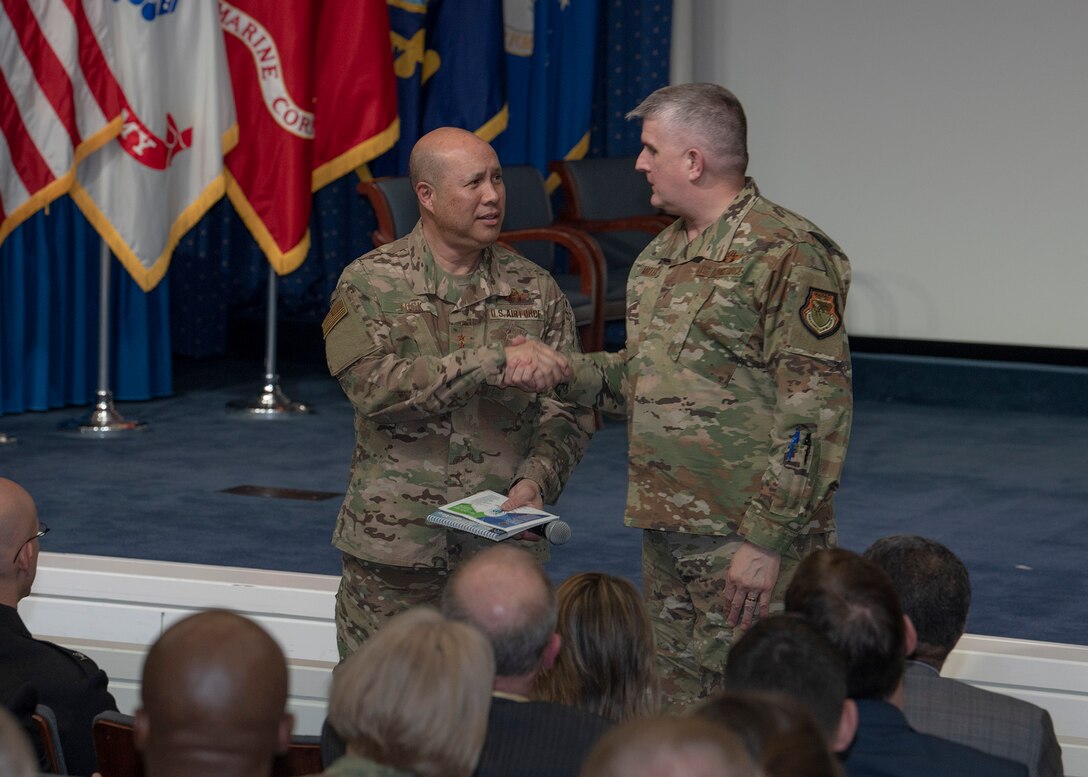 two general officers shake hands