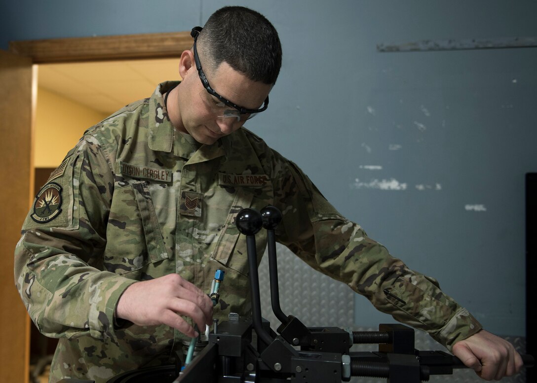 Tech. Sgt. Robert Dyson-Cersley, 4th Equipment Maintenance Squadron aircraft structural maintenance production supervisor, bends a fuel sense line tubing assembly using a production tube bender, Feb. 4, 2020, at Seymour Johnson Air Force Base, N.C.