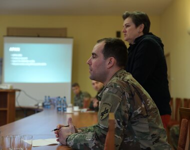 418th Civil Affairs Soldiers meet with local leaders in Zagan, Poland