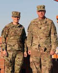 Indiana National Guard 1st Lt. Sara Holloway and Sgt. 1st Class Jacob Holloway at a base camp in the Middle East Jan. 25, 2020. The Holloways are deployed with two Indiana units, the 1313th Engineer Company and 38th Infantry Division, respectively, and they deployed in 2015 together supporting Operation Enduring Freedom.