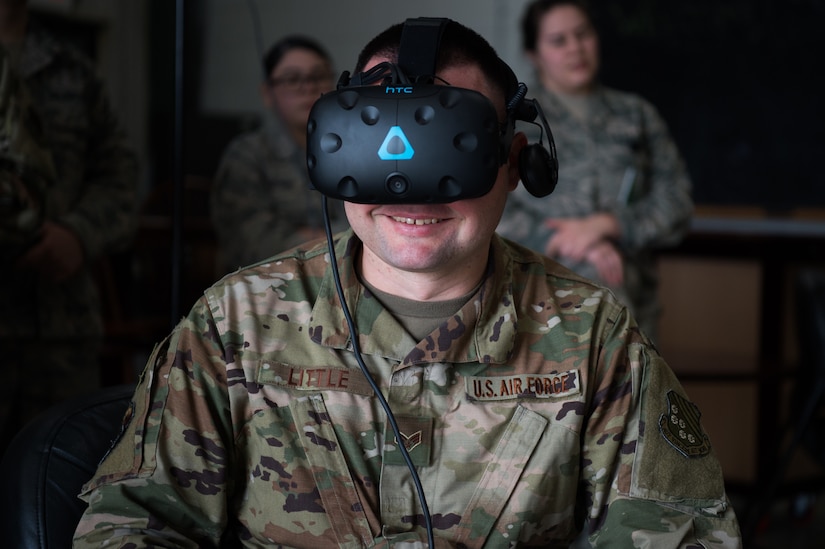 U.S. Senior Airman Joshua Little, 1st Operations Support Squadron intel analyst, use a virtual reality system brought to Joint Base Langley-Eustis, Virginia, by Airmen from the 547th Intelligence Squadron, Nellis Air Force Base, Nevada, Feb. 12, 2020.