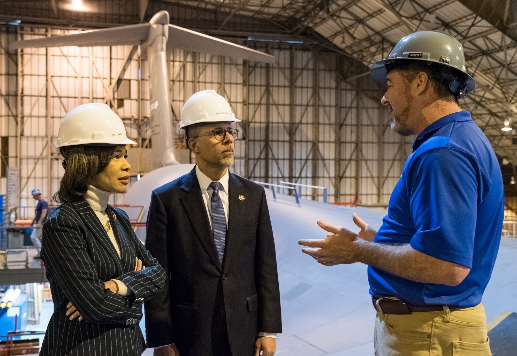 John Greim, 436th Maintenance Squadron Isochronal Inspection Dock controller, explains the C-5M isochronal inspection process to Rep. Lisa Blunt Rochester of Delaware and Rep. Anthony Brown of Maryland Feb. 14, 2020, on Dover Air Force Base, Delaware. Greim briefed the representatives atop a C-5M Super Galaxy that was on its 40th day of a major isochronal inspection. (U.S. Air Force photo by Roland Balik)