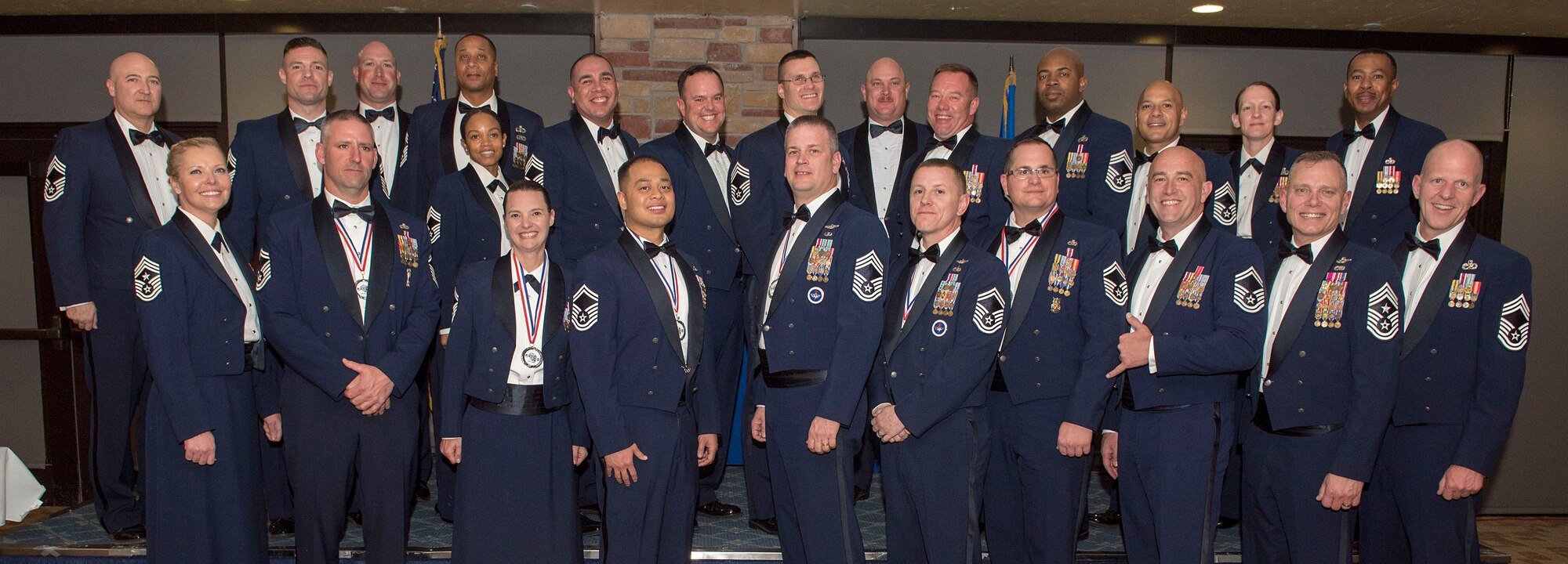 Recently inducted and current Team Holloman Chief Master Sergeants pose for a photo during the Chief Recognition Ceremony, Feb. 15, 2020, on Holloman Air Force Base, N.M. Eight individuals from Team Holloman were recognized during the formal ceremony and dinner. (U.S. Air Force photo by Staff Sgt. Christine Groening)