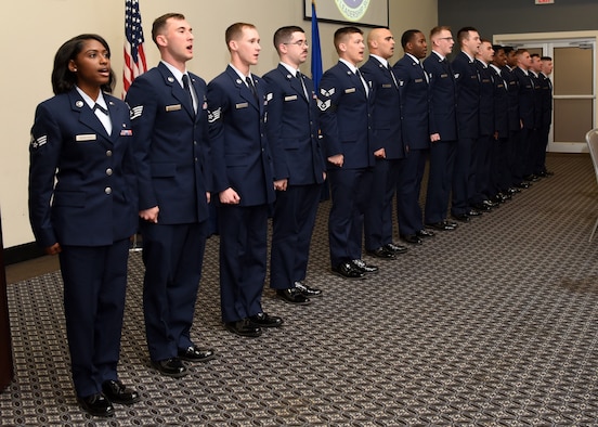 U.S. Air Force Airman Leadership School graduates sing the Air Force song during the ALS Graduation Ceremony in the event center at Goodfellow Air Force Base, Texas, Feb. 13, 2020.  The graduates charge the attendees to join in with singing, in recognition to Air Force heritage and honor. (U.S. Air Force photo by Airman 1st Class Abbey Rieves)