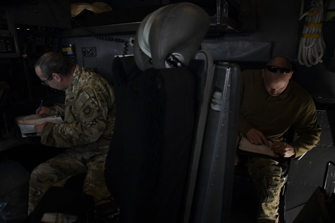 a picture of Airmen and Aircraft