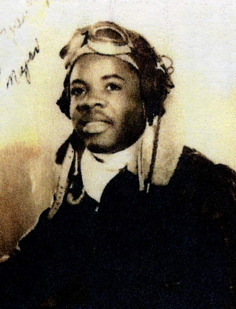 Black teenager posing with aviator goggles in 1943