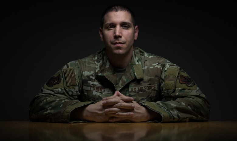 U.S. Air Force Master Sgt. Ryan Powers, 633rd Medical Group internal medicine non-commissioned officer in-charge, sits at a table at Joint Base Langley-Eustis, Virginia, Feb. 13, 2019. Powers was injured during a deployment and is now a Wounded Warrior. (U.S. Air Force photo by Airman 1st Class Sarah Dowe)