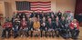 Twenty-eight Iwo Jima veterans and members of the Iwo Jima Commemorative Committee pose for a group photo after the 75th Commemoration of the Battle of Iwo Jima ceremony at Marine Corps Base Camp Pendleton, California, Feb. 15.