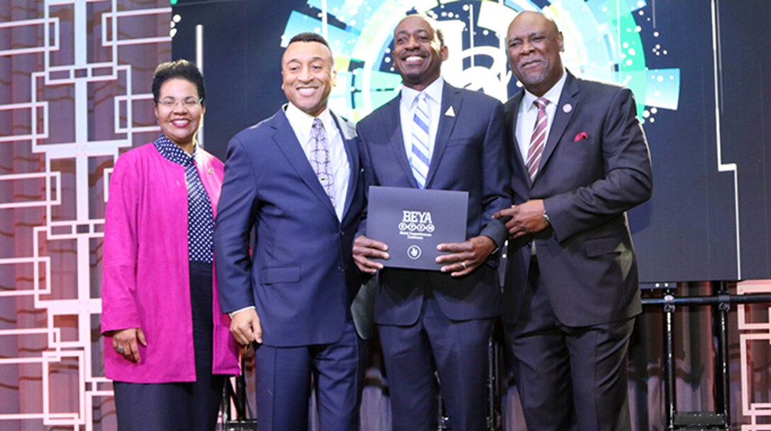 Allan Steele (Second from right), senior electrical engineer with the U.S. Army Corps of Engineers Nashville District’s Hydropower Section, is honored as a “Modern-Day Technology Leader” during the 34th Black Engineer of the Year Awards Technology Recognition Luncheon Feb. 14, 2020 in Washington D.C.  Dr. Robin N. Coger, dean of the College of Engineering at North Carolina A&T University, Marsh M. Williams (Second from Left), principle deputy assistant secretary of the Army, and Dr. Kendall Harris, provost and vice president of Academic Affairs at Texas Southern University, made the presentation. (Courtesy Asset)