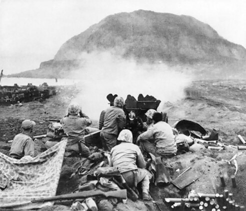 Marines fire on Japanese fortifications on Iwo Jima on, or shortly after, Feb. 19, 1945.