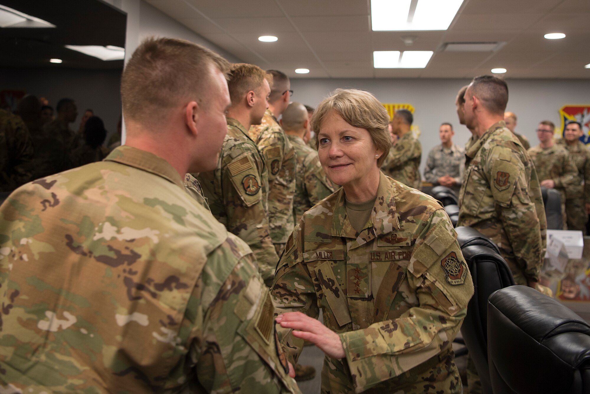 U.S. Air Force Gen. Maryanne Miller, Air Mobility Command commander, greets a 6th Air Refueling Wing Airman at MacDill Air Force Base, Fla., Feb. 13, 2020. During her visit, Miller met with aircraft maintenance Airmen and listened to their questions and concerns.