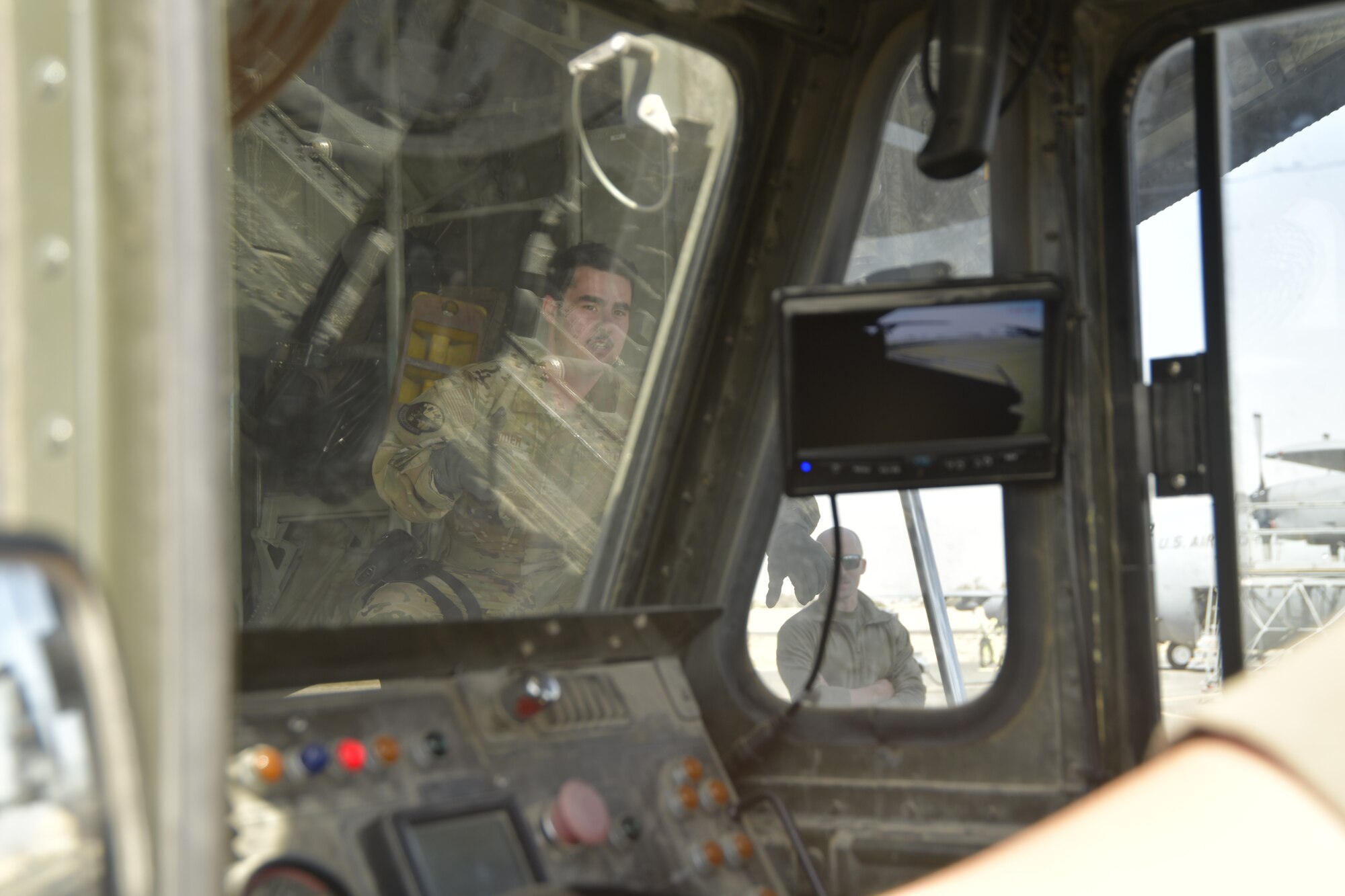 a picture of Airmen and Aircraft