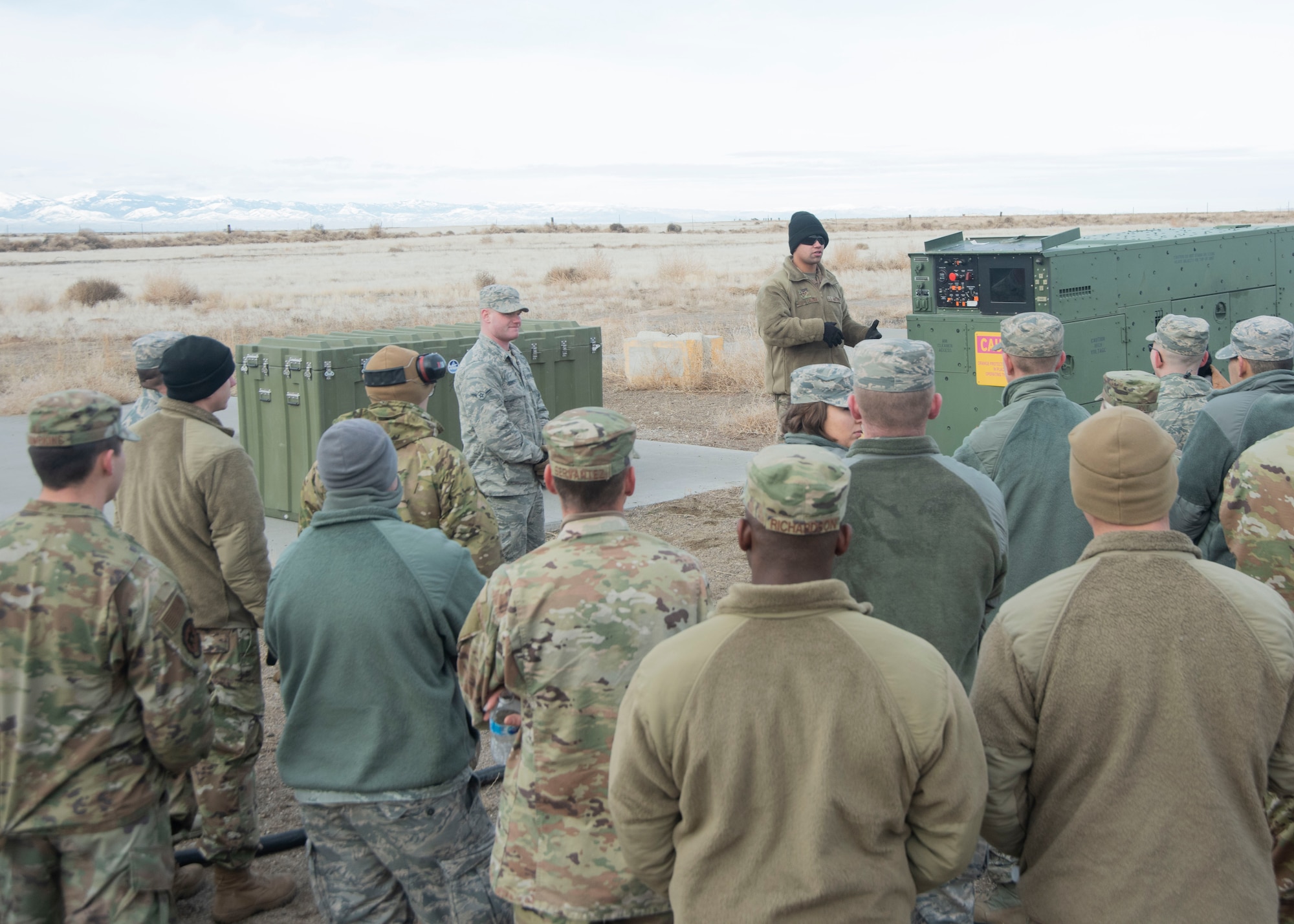 U.S. Air Force Staff Sgt. Kevin Rivera Calzada, 366th Civil Engineering Squadron power production journeyman, briefs the trainees of the Base Emergency Engineer Force the components of the generator, Jan. 23, 2020, on Mountain Home Air Force Base, Idaho. The briefing prepares the trainees on what to do if the members of the power production crew are not available. (U.S. Air Force photo by Airman 1st Class Akeem K. Campbell)