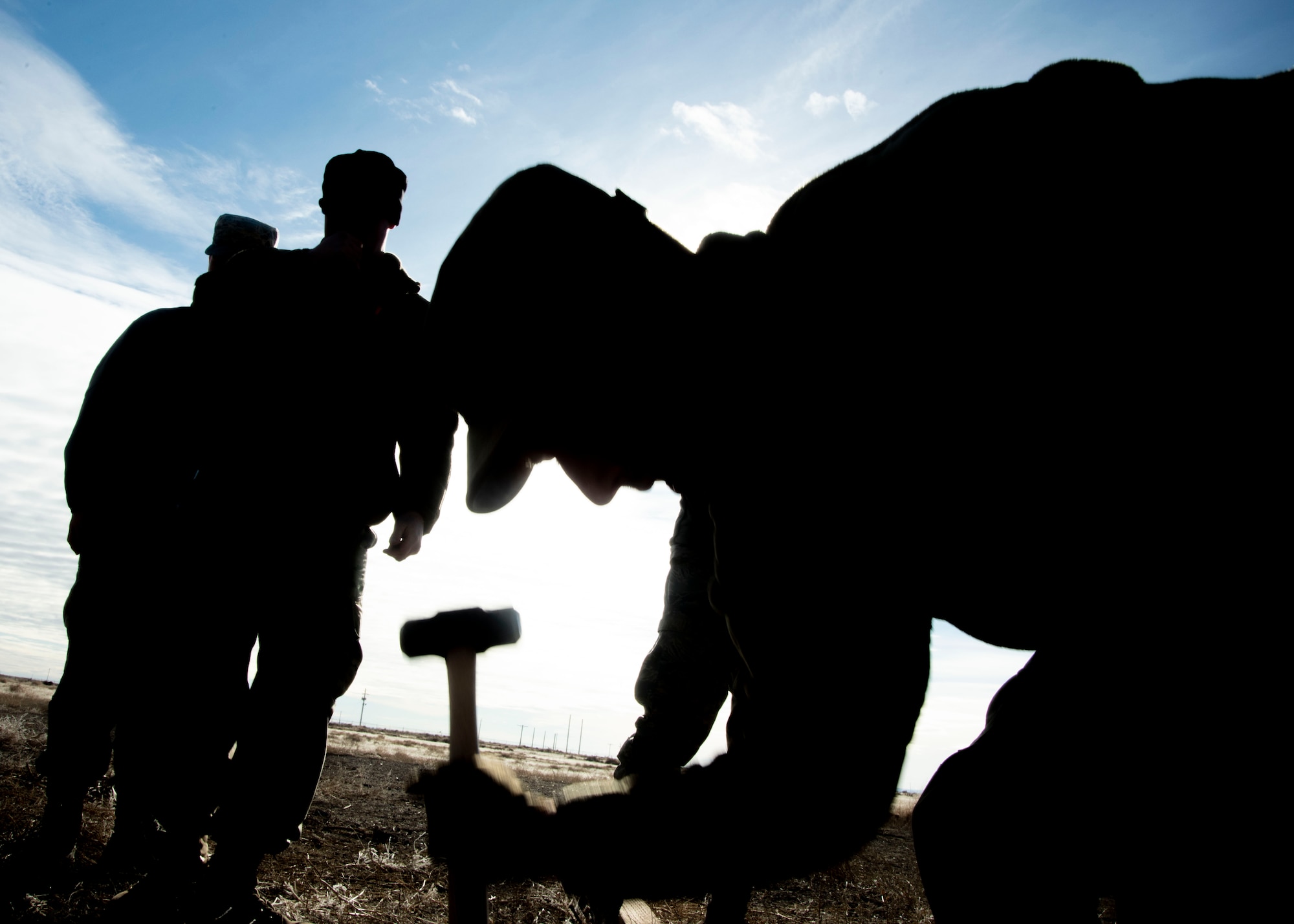 A group of U.S. Air Force Airmen participate in the Base Emergency Engineer Force training, Jan. 23, 2020, on Mountain Home Air Force Base, Idaho. This training was conducted to equip Airmen with skills from other career fields to enhance their readiness and multi-functionality. (U.S. Air Force photo by Airman 1st Class Akeem K. Campbell)