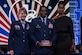 Col. Terrance A. Adams, commander of the 628th Air Base Wing and Joint Base Charleston, S.C., along with his sister, Felicia Johnson, accepted the Military Service Award from Gen. Maryanne Miller, Air Mobility Command commander, at the 2020 Black Engineer of the Year Stars and Stripes dinner, Feb. 14, 2020, Washington, D.C. Adams earned the award for his more than 14 years of service to BEYA and over 5,000 students reached. (U.S. Air Force photo by Staff Sgt. James Richardson)