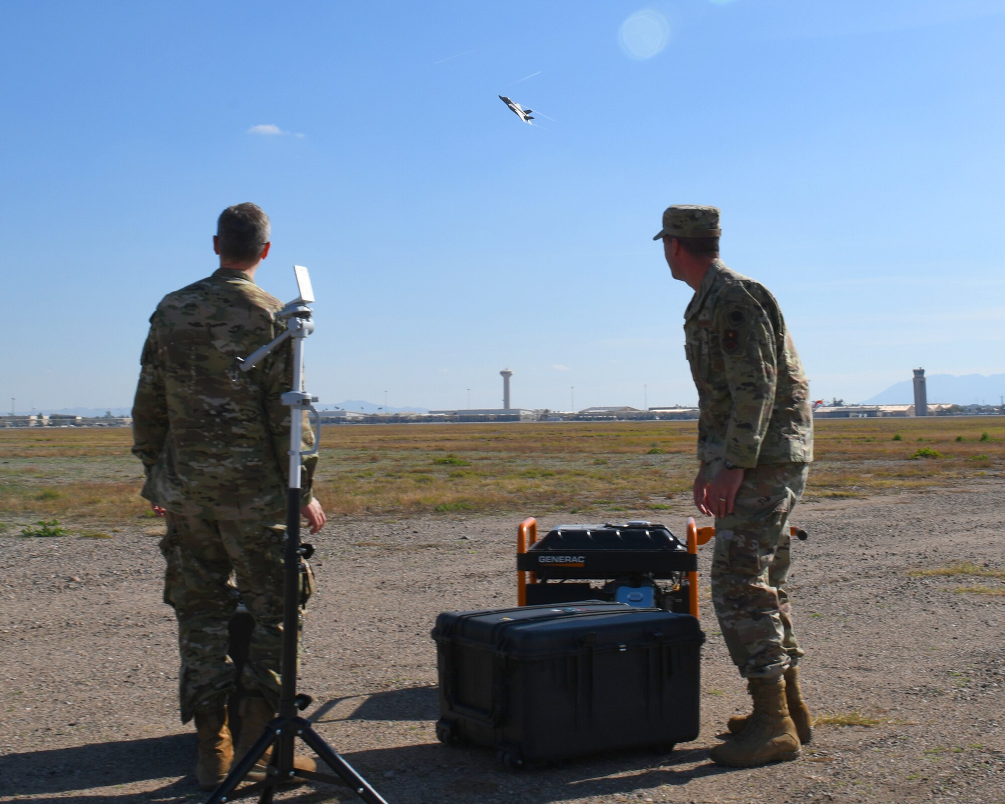 First Lt. Adam Treece, 56th Operations Support Squadron intelligence readiness chief, and Capt. David Coyle, 56th OSS weapons officer, showcase a prototype threat emitter system Jan. 17, 2020, at Luke Air Force Base, Ariz.