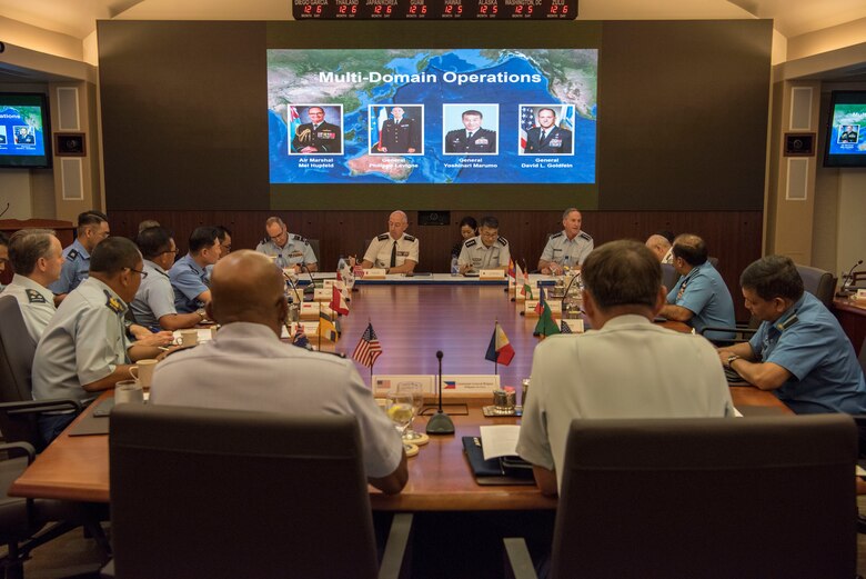 Air Marshal Mel Hupfeld, chief, Royal Australian Air Force; Gen Philippe Lavigne, chief of staff, French Air Force; Gen Yoshinari Marumo, chief, Japan Air Self-Defense Force; and Gen David L. Goldfein, chief of staff, US Air Force participate in a multi-domain operations panel during the 2019 Pacific Air Chiefs Symposium (PACS) at Joint Base Pearl Harbor–Hickam, Hawaii, 5 December 2019.