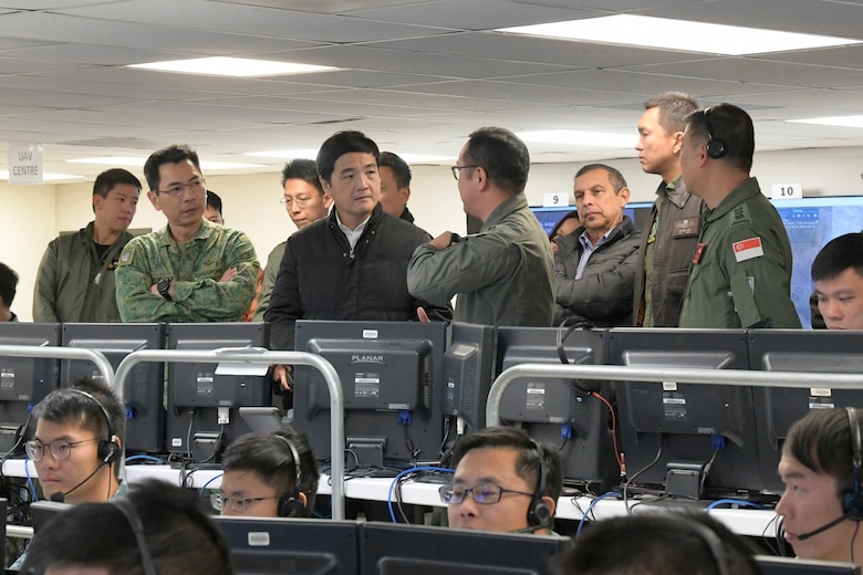 Singapore’s Senior Minister of State for Defence Heng Chee How receives a brief on the capabilities of the command post at Exercise Forging Sabre 2019, hosted at Mountain Home AFB, Idaho.