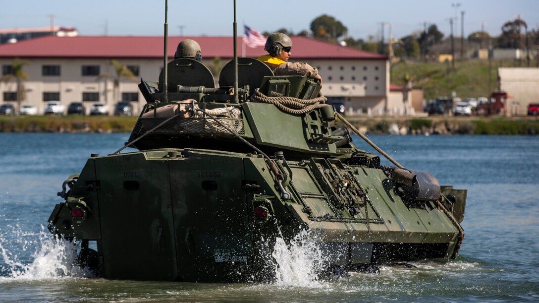 U.S. Marines with Light Armored Reconnaissance Training Company, Advanced Infantry Training Battalion, School of Infantry - West, operate a LAV-25 Light Armored Vehicle during LAR Marine Course 2-20’s LAV swim operations at the Del Mar boat basin on Marine Corps Base Camp Pendleton, California, Feb. 11, 2020. The mission of LARTC is to train entry-level light armored reconnaissance crewmen in the tactical employment of the LAV. (U.S. Marine Corps photo by Lance Cpl. Melissa I. Ugalde)