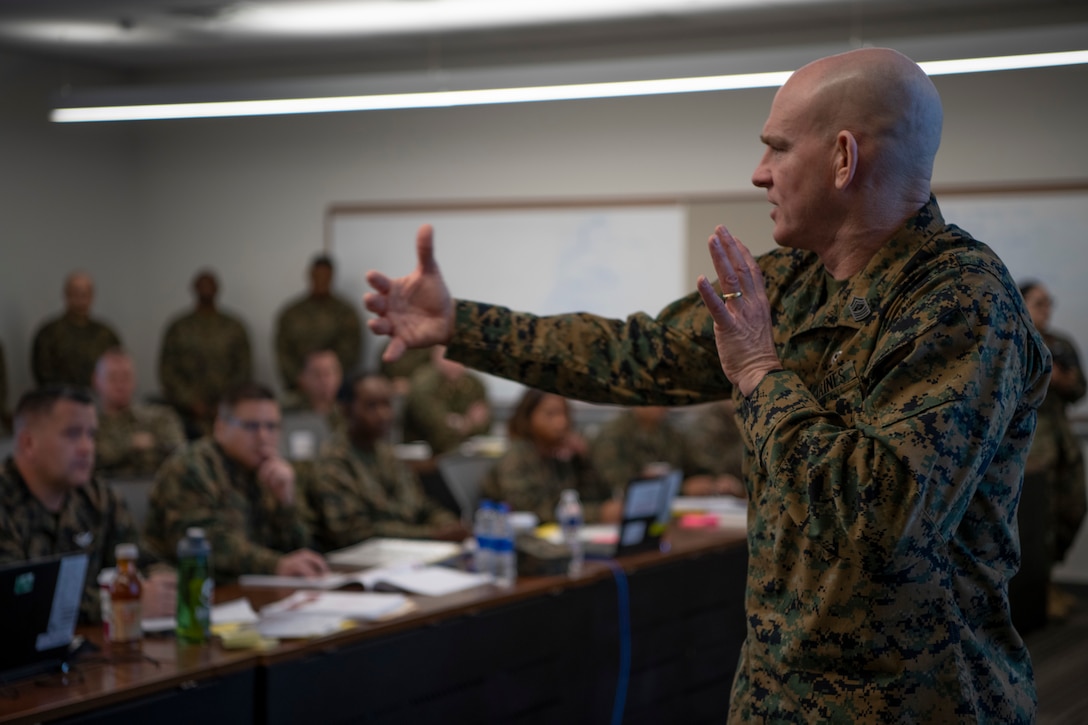 U.S. Marine Corps Sergeant Major of the Marine Corps Sgt. Maj. Troy E. Black engages with senior and junior Marines during the Recruiting and Retention Continuum Summit at Marine Corps Base Quantico, Va., Feb. 3, 2020. The attendees were solicited to provide the Commandant of the Marine Corps with opinions and recommendations on how to improve education, health, recruitment, and retainment of Marines in a professional environment.