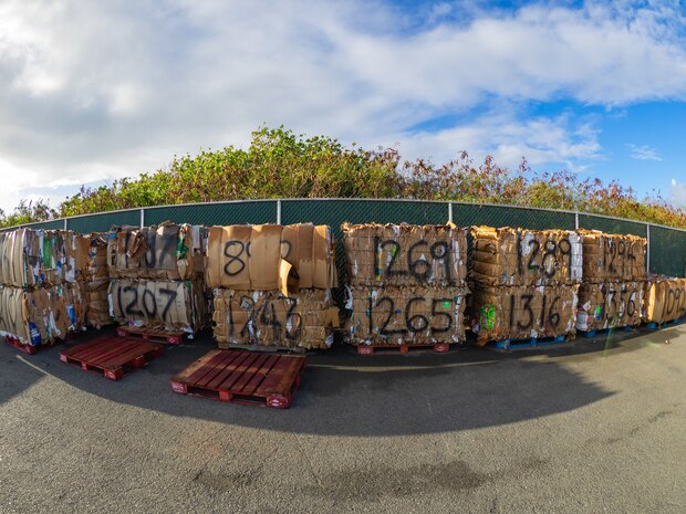 Cardboard bales after staff have sorted and prepared it for shipping.