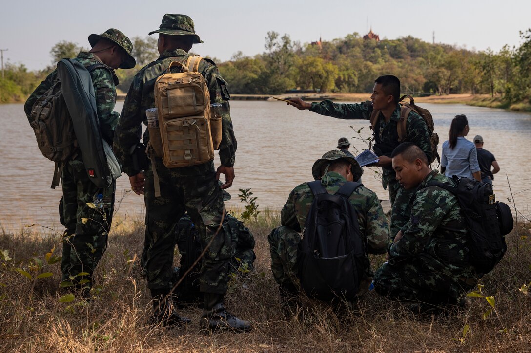 Service members with the Royal Thai Armed Forces conduct Non-Technical Surveys at Jarumanee Training Area, Ratchaburi Province, Kingdom of Thailand, Jan. 27, 2020. These surveys consist of interviewing locals and gathering information on possibly mined areas. U.S. Marine Corps Combat Engineers and US Navy Corpsman with 9th Engineer Support Battalion, 3rd Marine Logistics Group, worked alongside Thai deminers with the Thailand Mine Action Center, the national authority for defining operations, and a joint command of the Royal Thai Armed Forces to instruct military students on the tactics, techniques and procedures for locating and disposing of explosive remnants of war and unexploded ordnance to alleviate human suffering, release hazardous land areas, and save lives. (U.S. Marine Corps photo by Lance Cpl. Armando Elizalde)