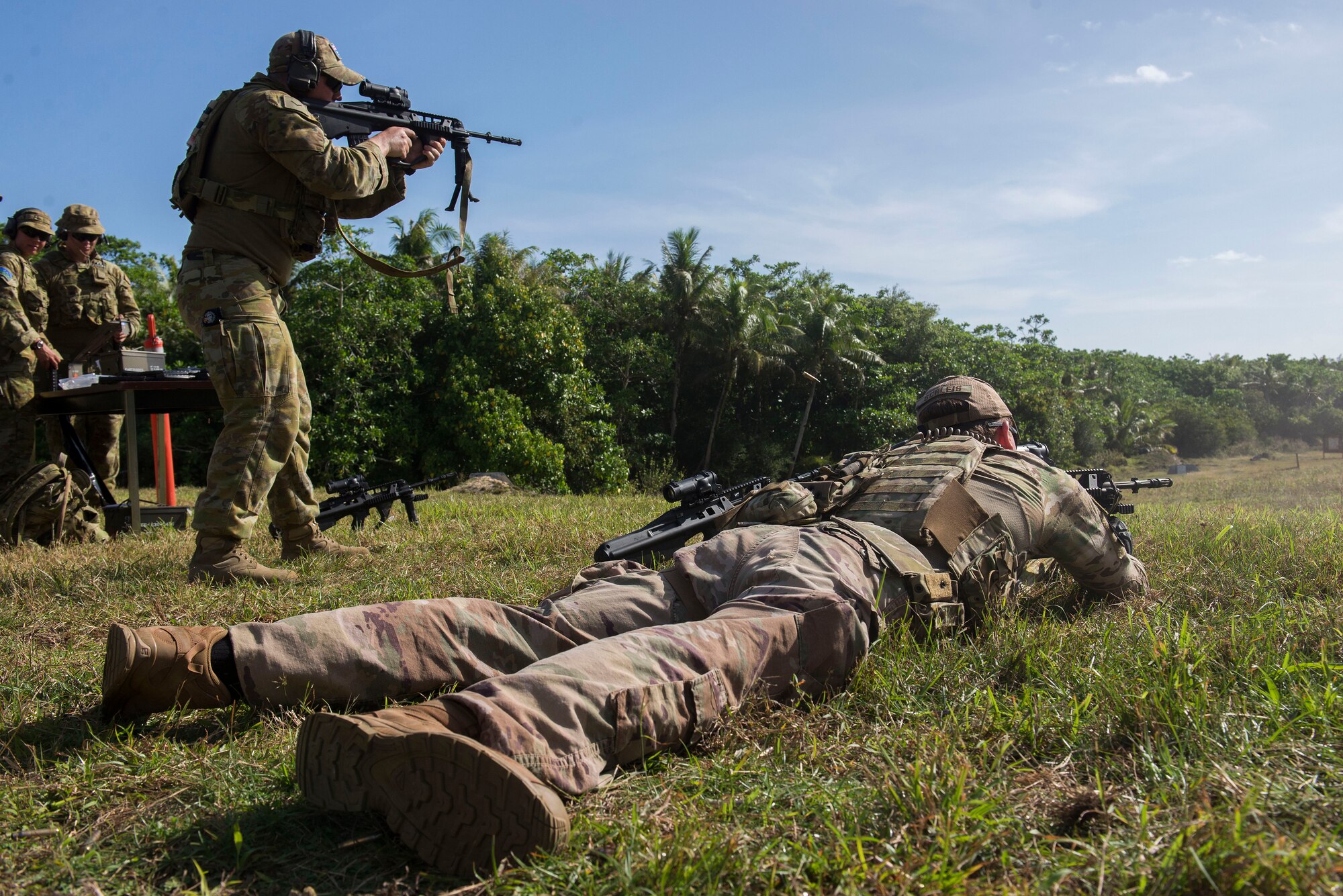 U.S. Air Force and Royal Australian Air Force (RAAF) personnel practice shooting the U.S. Air Force M4 assault rifle during Pacific Defender 20-1 at Andersen Air Force Base, Guam, Feb. 12, 2020.