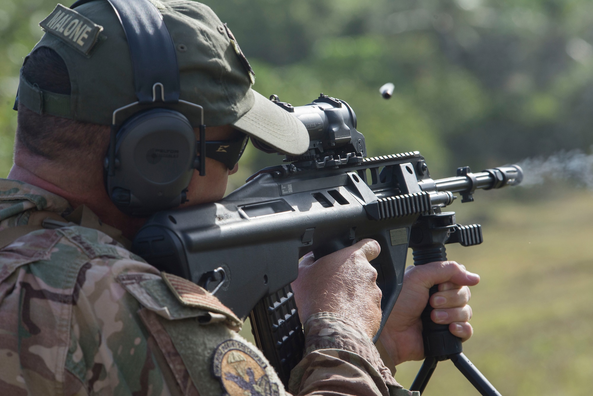 A member of the U.S. Air Force practices shooting the Royal Australian Air Force (RAAF) EF88 assault rifle during Pacific Defender 20-1 at Andersen Air Force Base, Guam, Feb. 12, 2020.