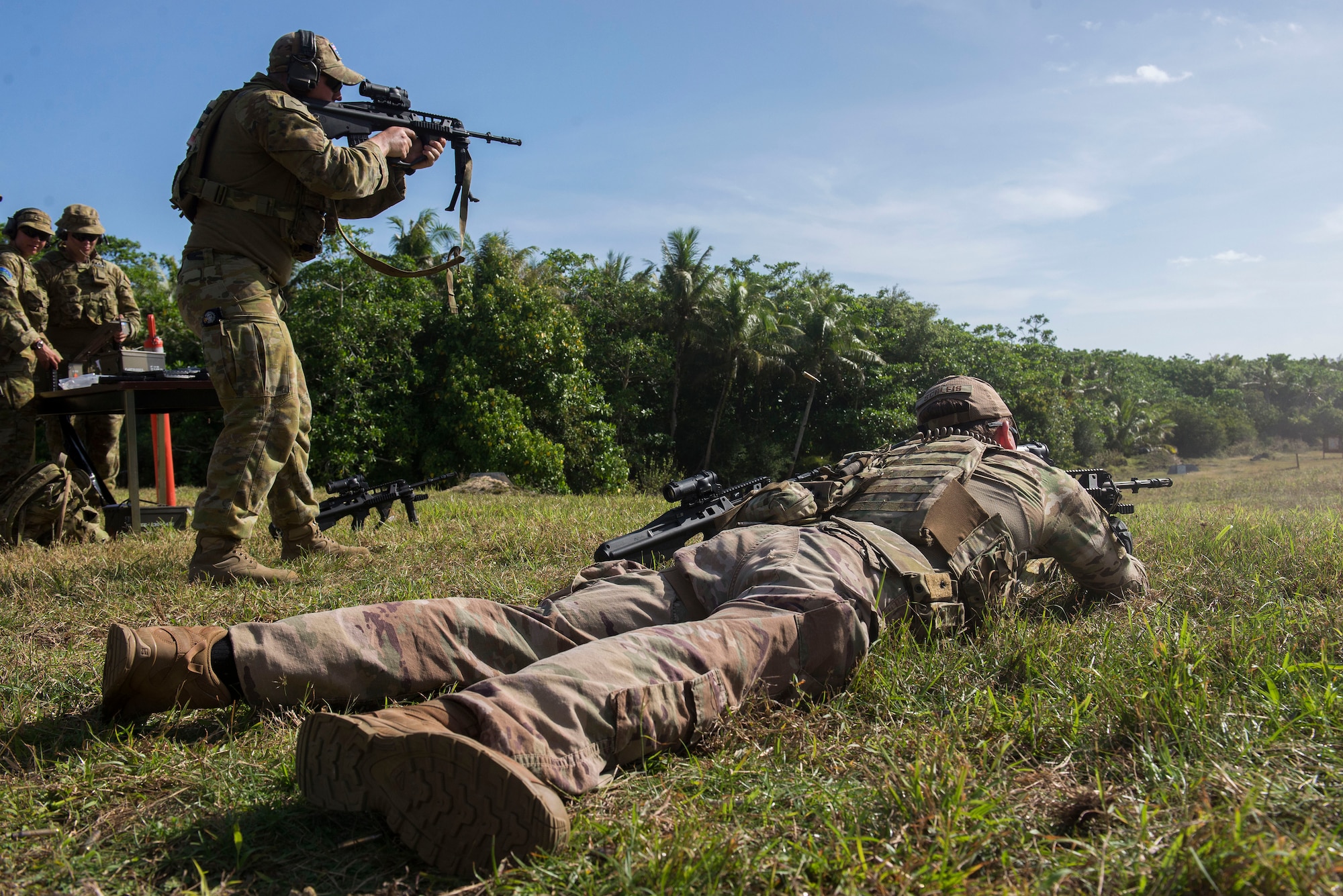 U.S. Air Force and Royal Australian Air Force (RAAF) personnel practice shooting the U.S. Air Force M4 assault rifle during Pacific Defender 20-1 at Andersen Air Force Base, Guam, Feb. 12, 2020.
