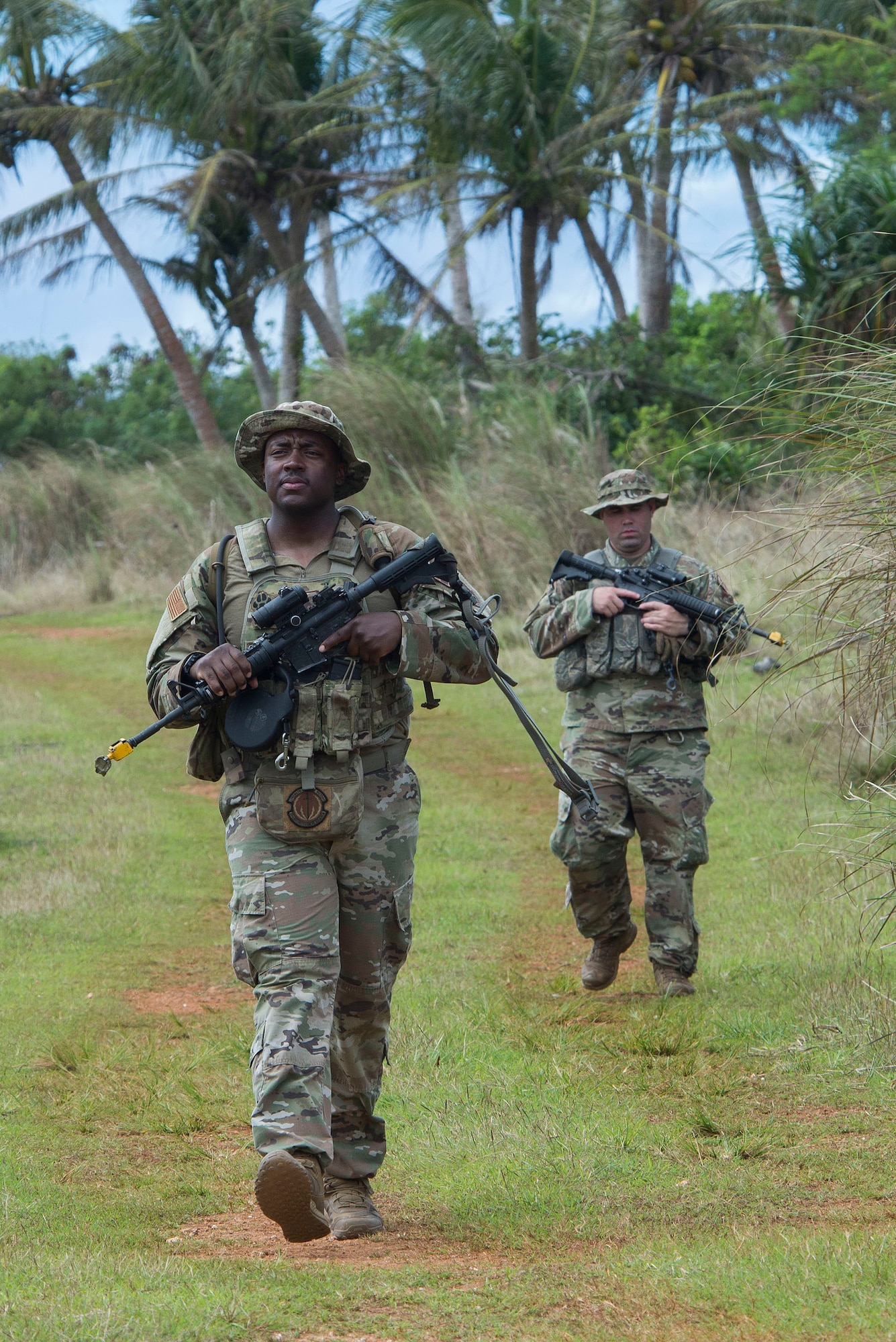 U.S. Air Force Tech. Sgt. Rowdy Spears, 736th Security Forces Squadron noncommissioned officer in charge of standards and evaluations, approaches a training scenario during Pacific Defender 20-1 at the Pacific Regional Training Center near Andersen Air Force Base, Guam, Feb. 10, 2020.
