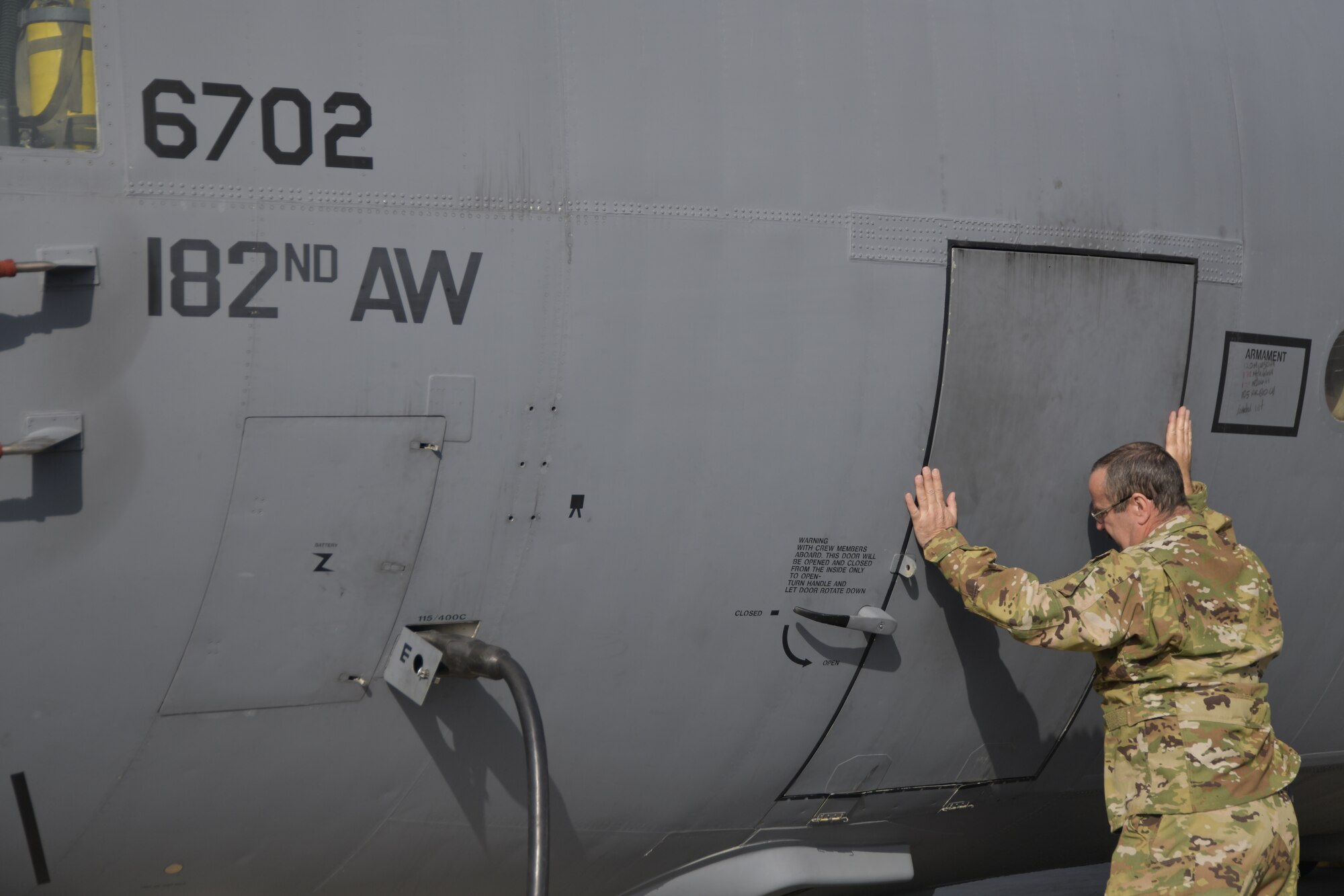 a picture of Airmen and Aircraft