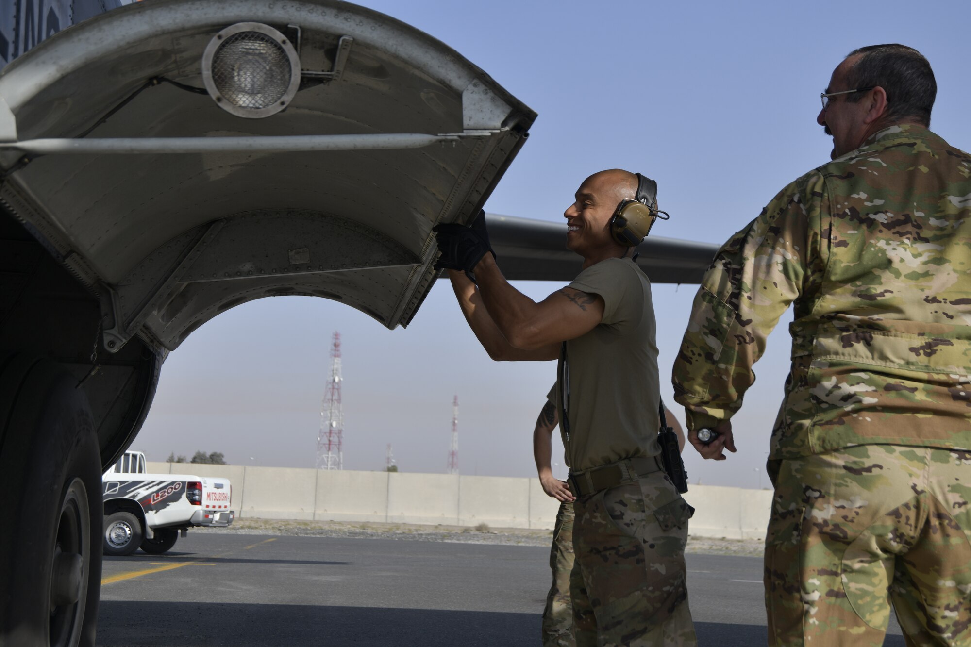 a picture of Airmen and Aircraft