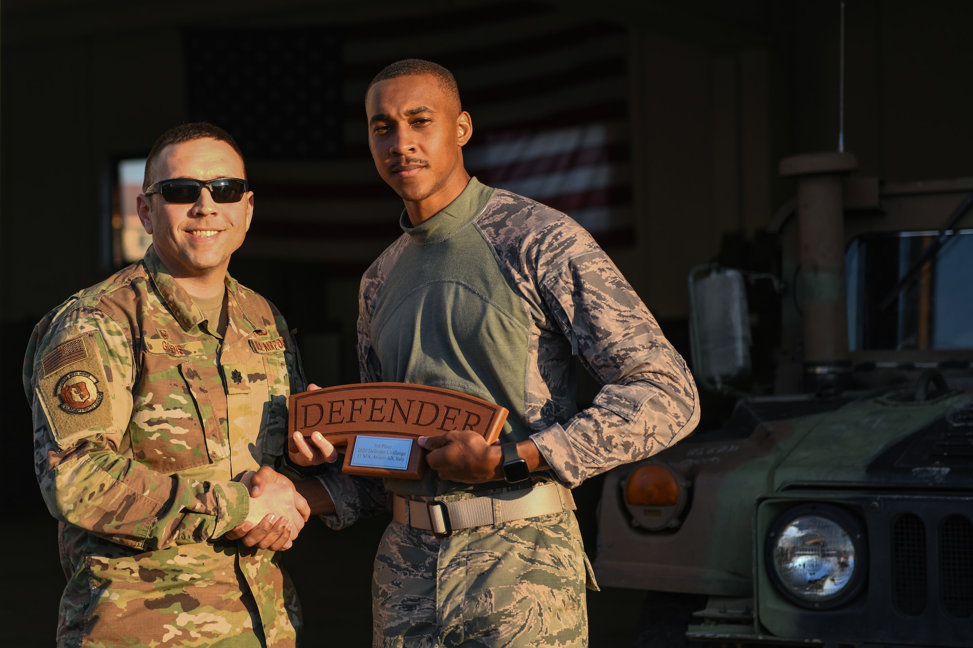 U.S. Air Force Lt. Col. Jesse Goens, 31st Security Forces Squadron commander, presents Aviano’s 2020 Defender Challenge award to U.S. Air Force Airman 1st Class Marcus Lafleur, 31st SFS member at Aviano Air Base, Italy, Feb. 14, 2020. Lafleur won third place. (U.S. Air Force photo by Airman 1st Class Ericka A. Woolever)