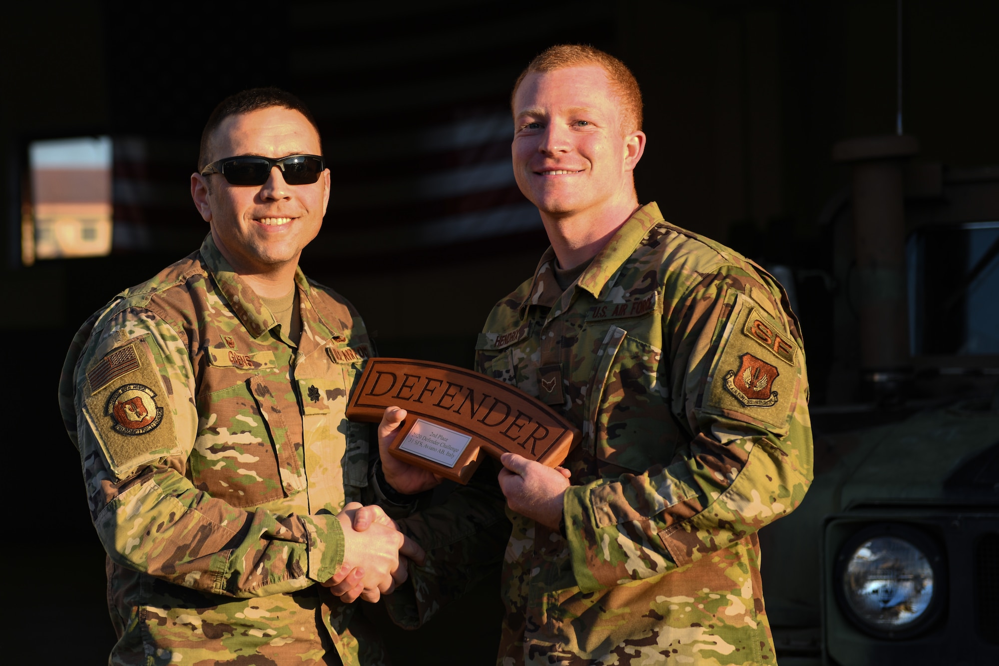 U.S. Air Force Lt. Col. Jesse Goens, 31st Security Forces Squadron commander, presents Aviano’s 2020 Defender Challenge award to U.S. Air Force Airman 1st Class Hunter B. Hendrix, 31st SFS member, at Aviano Air Base, Italy, Feb. 14, 2020. Hendrix won second place. (U.S. Air Force photo by Airman 1st Class Ericka A. Woolever)