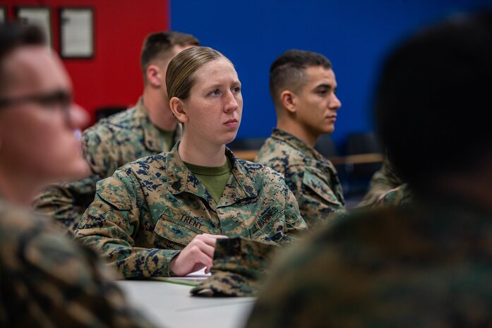 U.S. Marine Corps Sgt. Kyere Trent with 2nd Marine Logistics Group, sits in a Sergeant Symposium on Camp Lejeune, N.C. Feb.12, 2020. The symposium was held to encourage and develop sergeants through mentorship of senior leaders. (U.S. Marine Corps photo by Lance Cpl. Scott Jenkins)