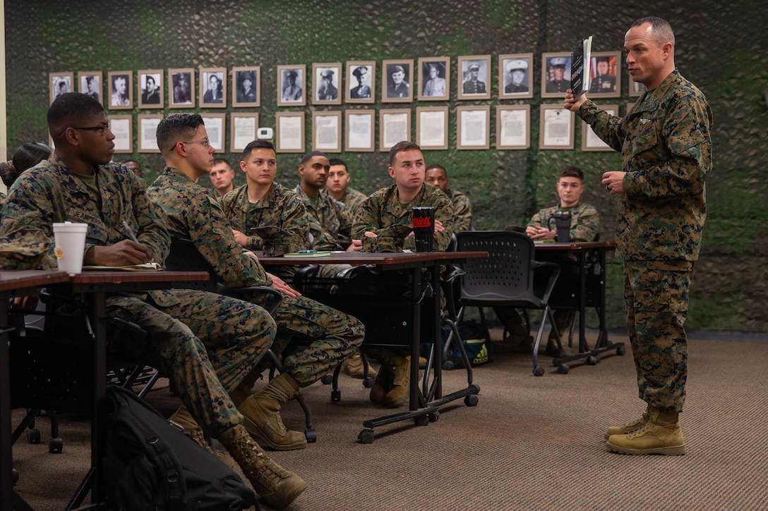 U.S. Marine Corps Sgt. Maj. Michael Martinet, sergeant major Combat Logistics Regiment 27, 2nd Marine Logistics Group, speaks to sergeants at a Sergeant Symposium on Camp Lejeune, N.C. Feb.12, 2020. The symposium was held to encourage and develop sergeants through mentorship of senior leaders. (U.S. Marine Corps photo by Lance Cpl. Scott Jenkins)