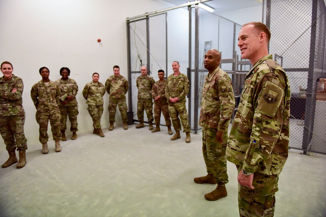 Col. Benjamin Jonsson, 379th Air Expeditionary Wing vice commander, and Chief Master Sgt. Kenneth Bruce, 379 AEW command chief, tour the wing's new communication security office following a ribbon cutting ceremony at Al Udeid Air Base, Qatar on Feb. 2, 2020. The new location is designed to enhance security and access for more than 40 unit account holders and 1,400 customers who rely on encrypted communication to conduct their missions throughout the U.S. Central Command area of responsibility. (U.S. Air Force photo by Tech. Sgt. John Wilkes)