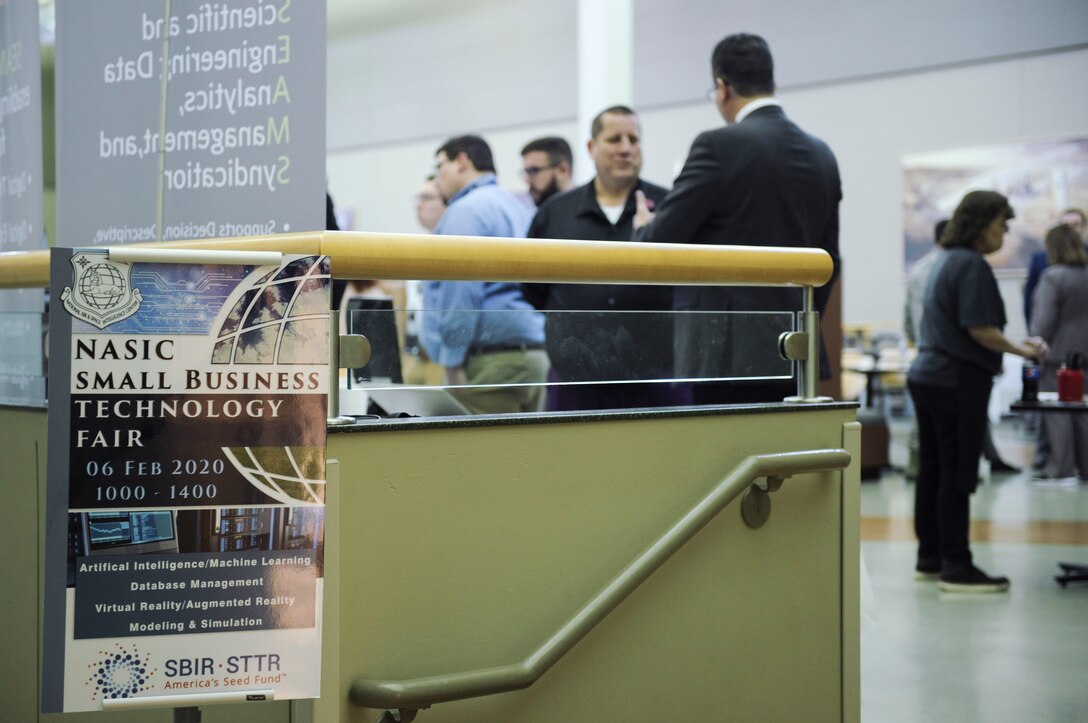 National Air and Space Intelligence Center members meet with representatives from a variety of technology companies during the Small Business Innovation Research Fair at Wright-Patterson AFB, Ohio, Feb. 6, 2020. The event showcased SBIR companies selected by NASIC subject matter experts as candidates to take on some of NASIC’s biggest technical challenges, artificial intelligence, machine learning, virtual reality, invisibility and big data. (U.S. Air Force photo by Staff Sgt. Seth Ray Stang.)